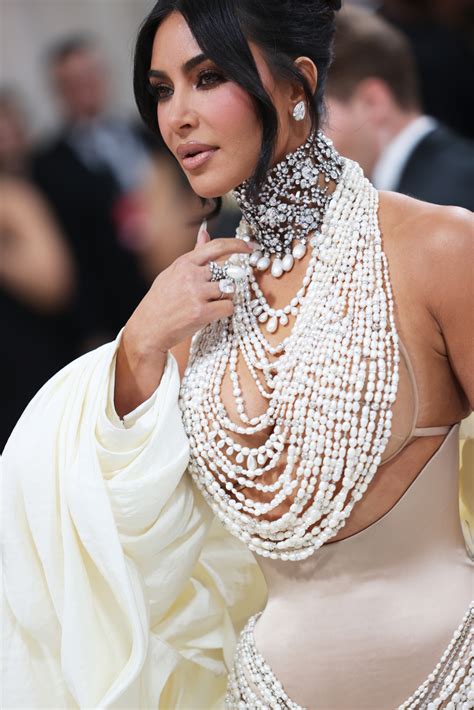 kim kardashian playboy pearls|Met Gala 2023: Kim Kardashian covers her bust with pearl。